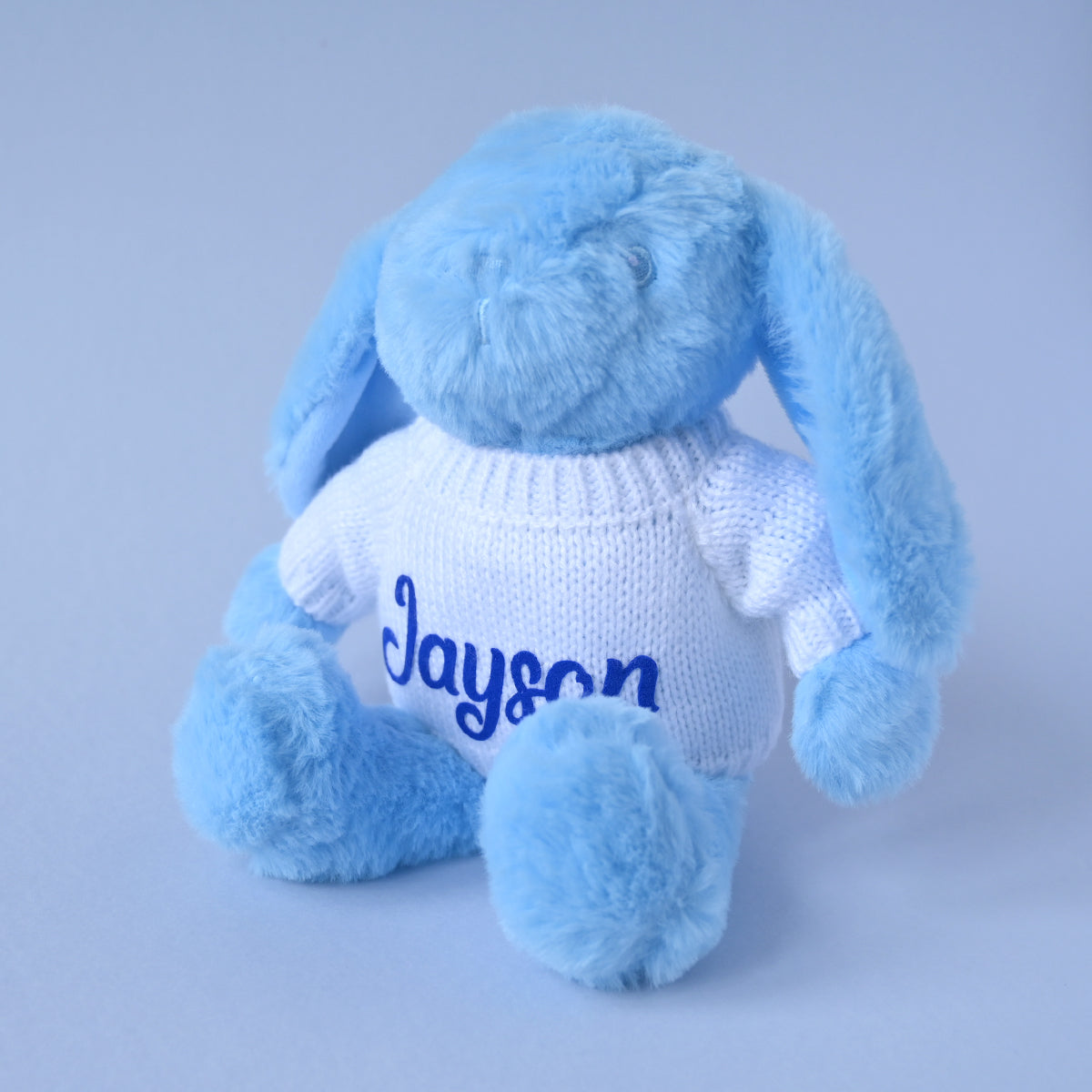 blue soft baby bunny with a jumper