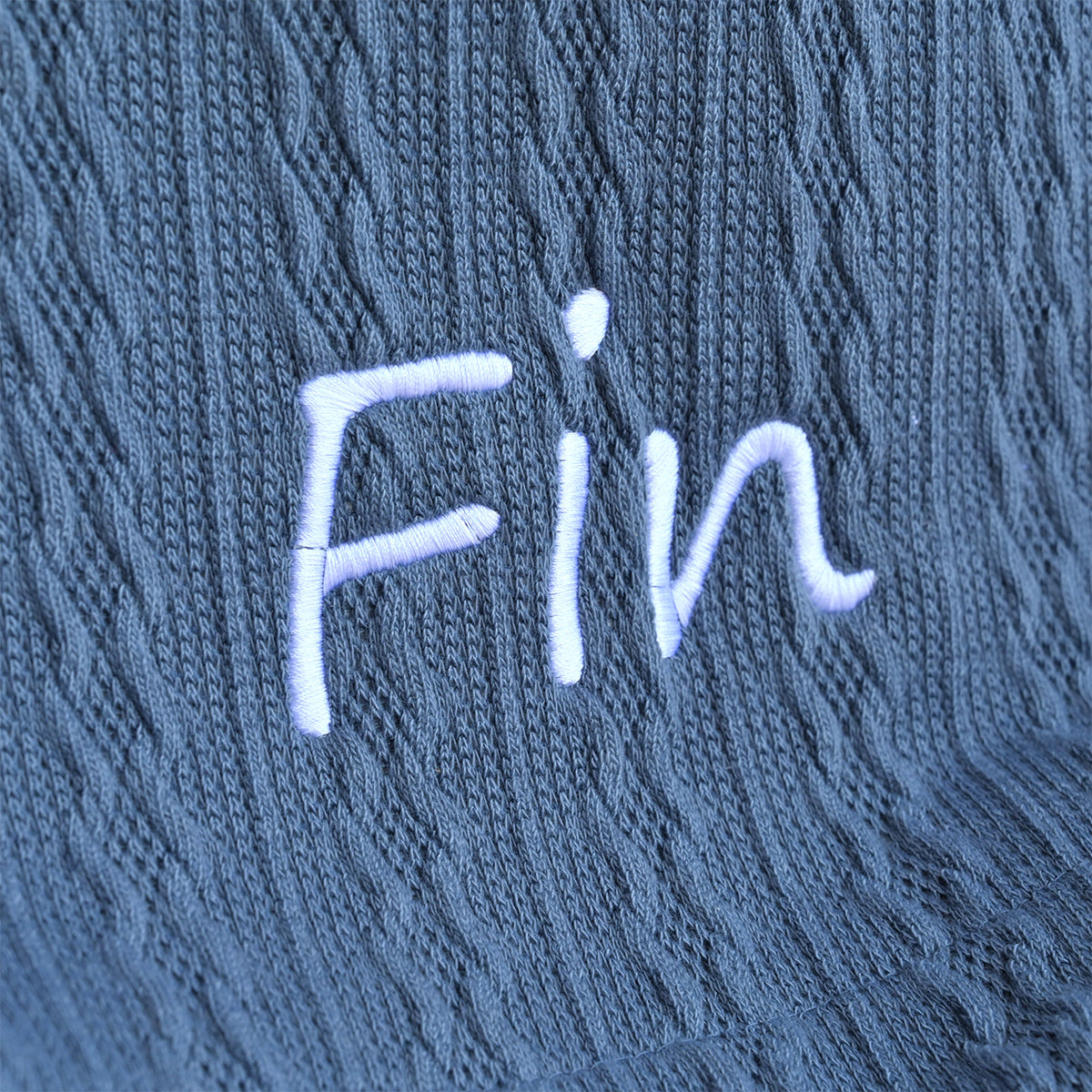 dark blue embroidered baby blanket