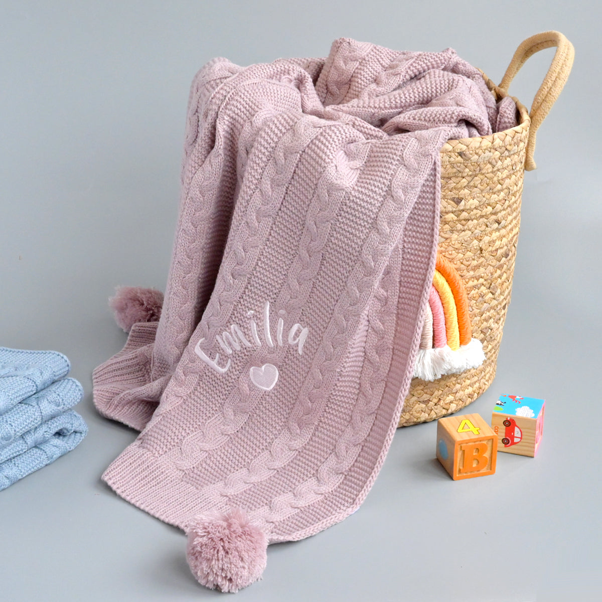 personalised pink cable knit baby blanket