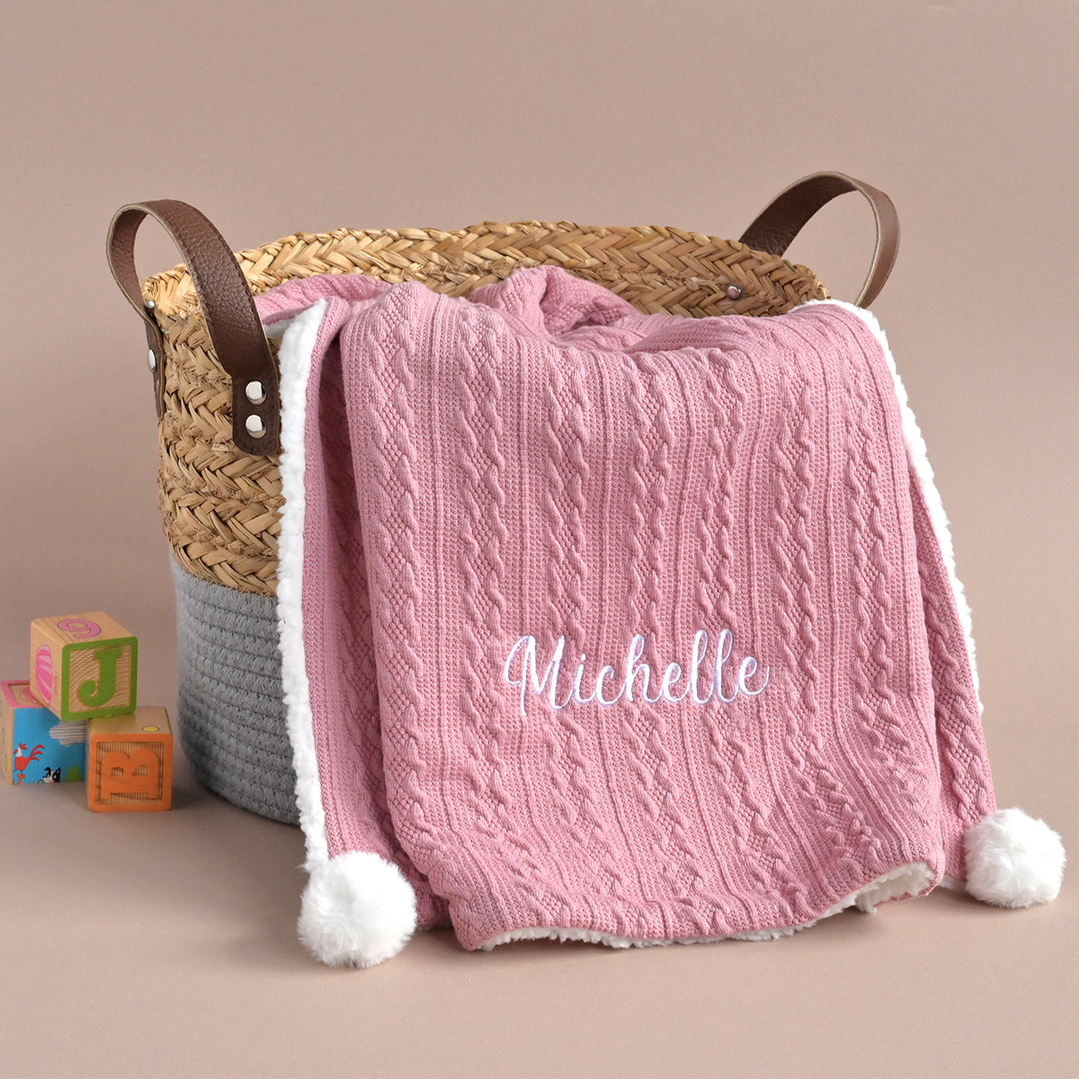 personalised embroidered knitted pink blanket