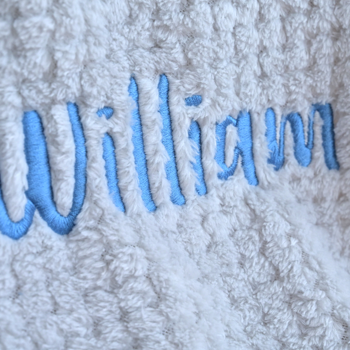 embroidered grey baby blanket