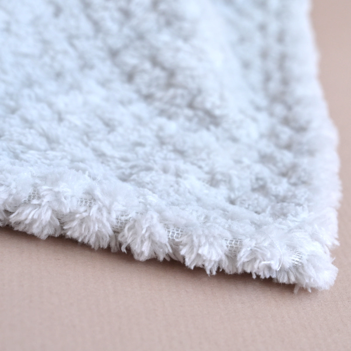 grey blanket with baby' name