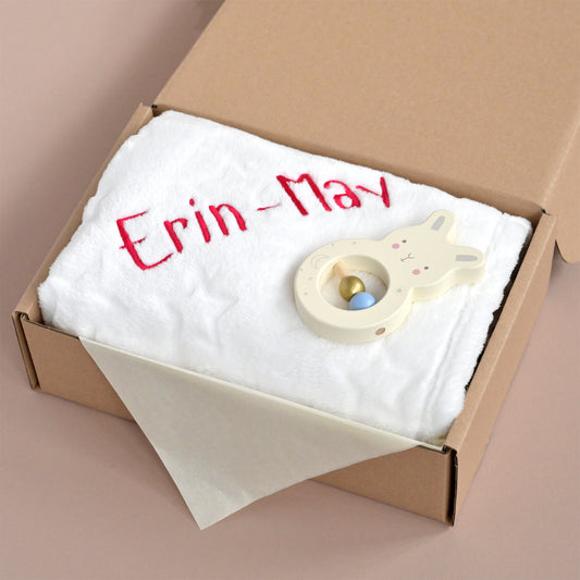 personalised newborn baby grl blanket with rattle