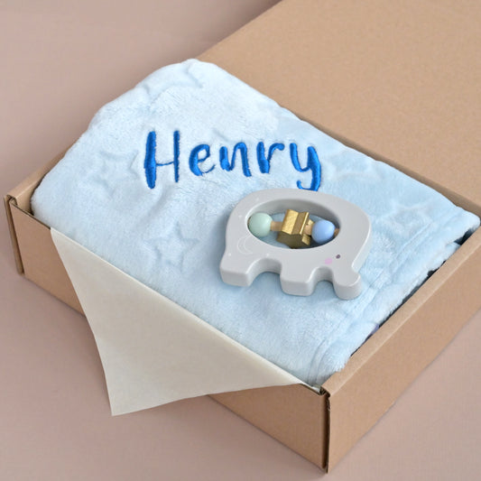 blue star baby blanket with elephant wooden rattle gift