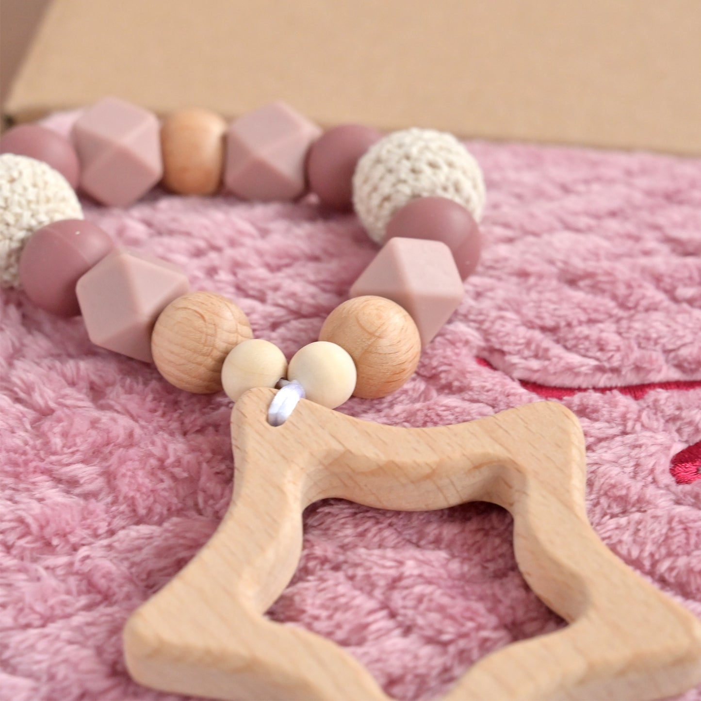 wooden star teether for a baby girl