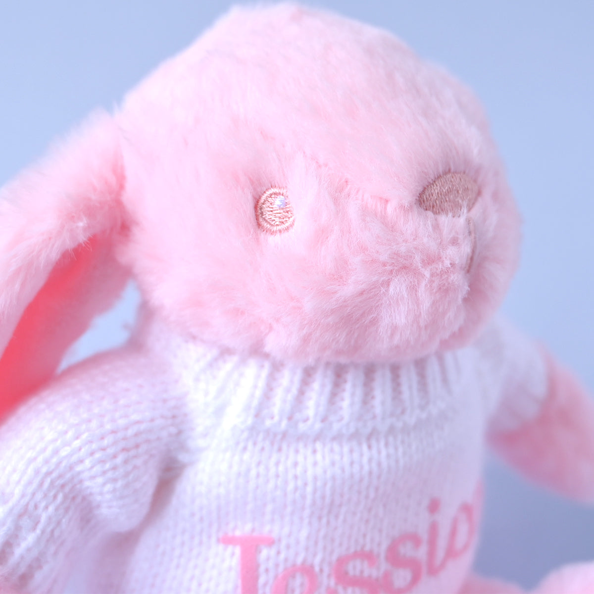 personalised pink bunny soft toy with a jumper