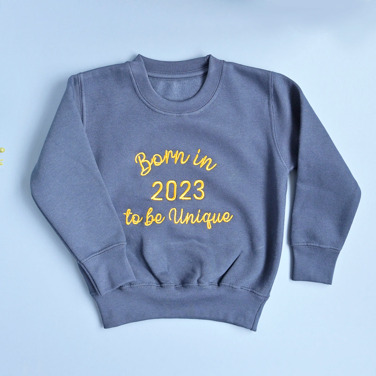 Kids Embroidered Sweatshirt "Born in to be Unique"