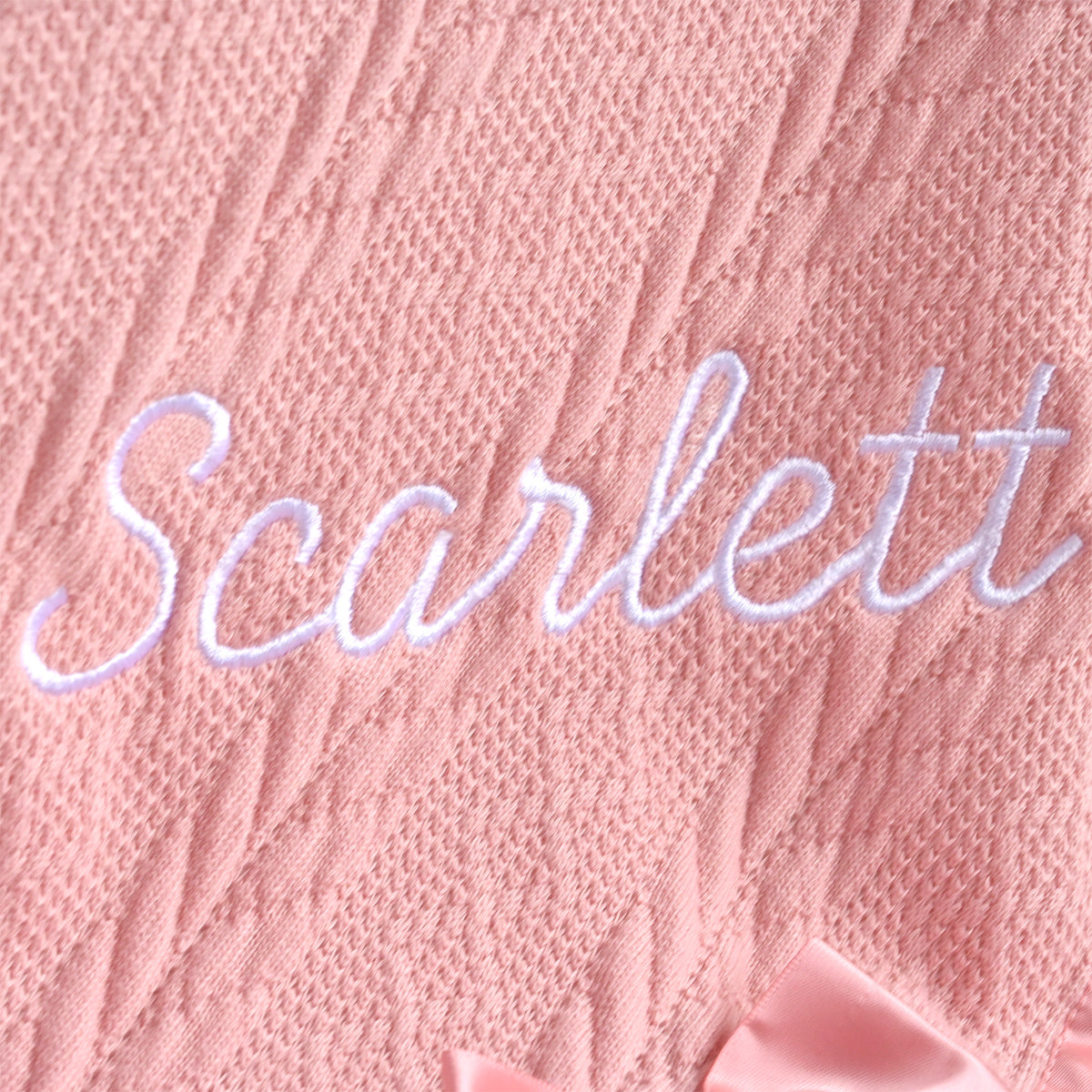 knitted blanket with embroidered name