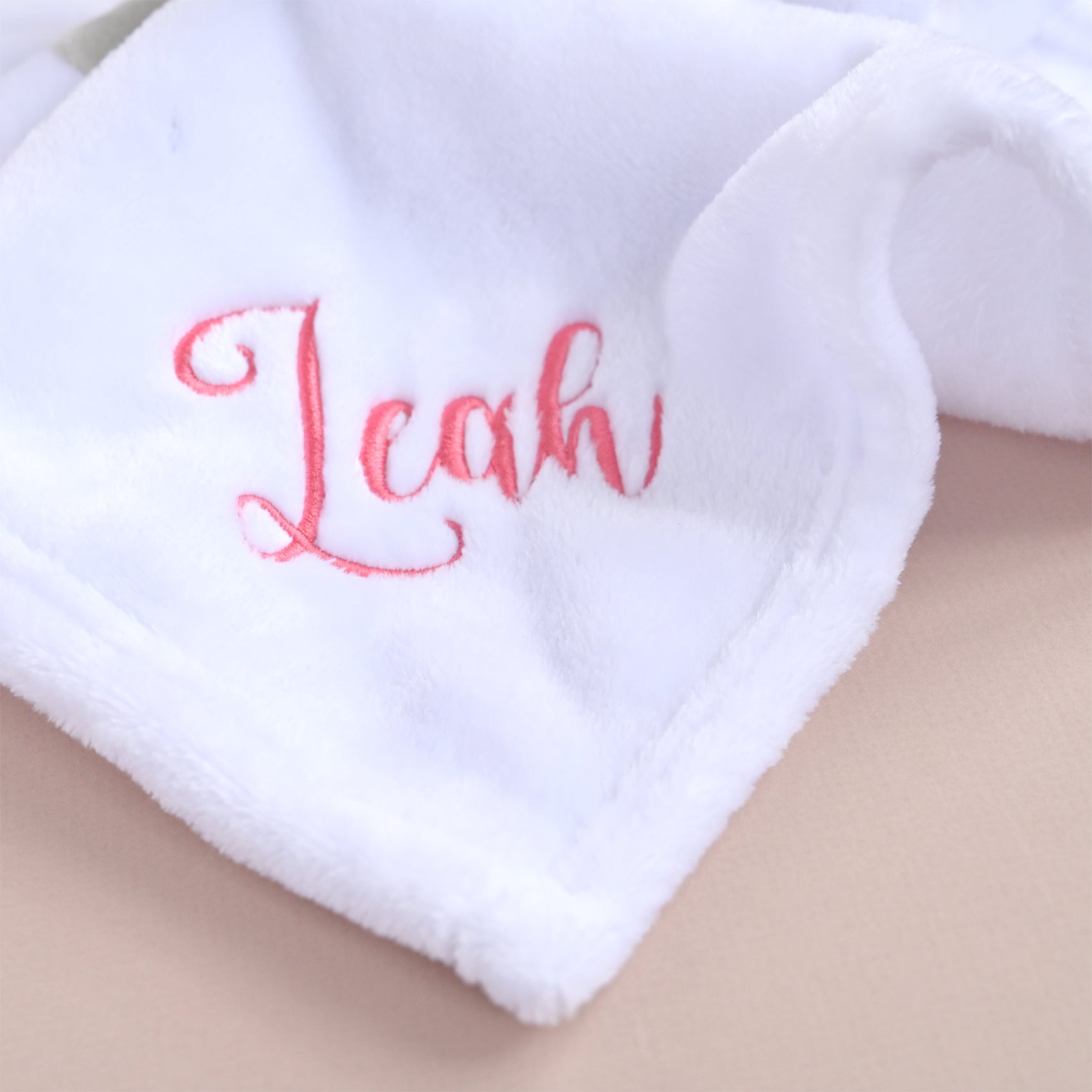 white soft fleece baby comforter with embroidered name